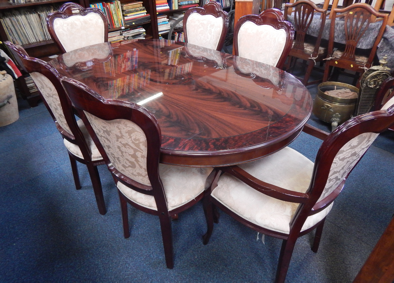 Appraisal: A Italian style dining table the veneered top with a