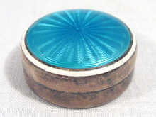 Appraisal: A small circular silver and enamel pill box marked cm