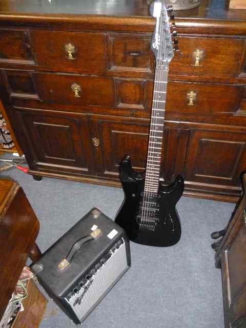 Appraisal: A FENDER SQUIRE SHOWMASTER ELECTRIC GUITAR together with a small