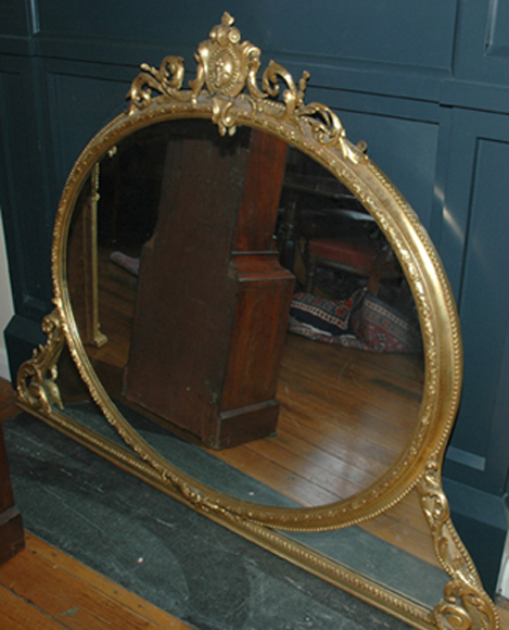 Appraisal: A TH CENTURY GILT FRAMED OVERMANTEL MIRROR The oval plate