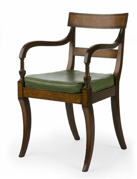 Appraisal: A Regency mahogany and satinwood elbow chair the plaque back