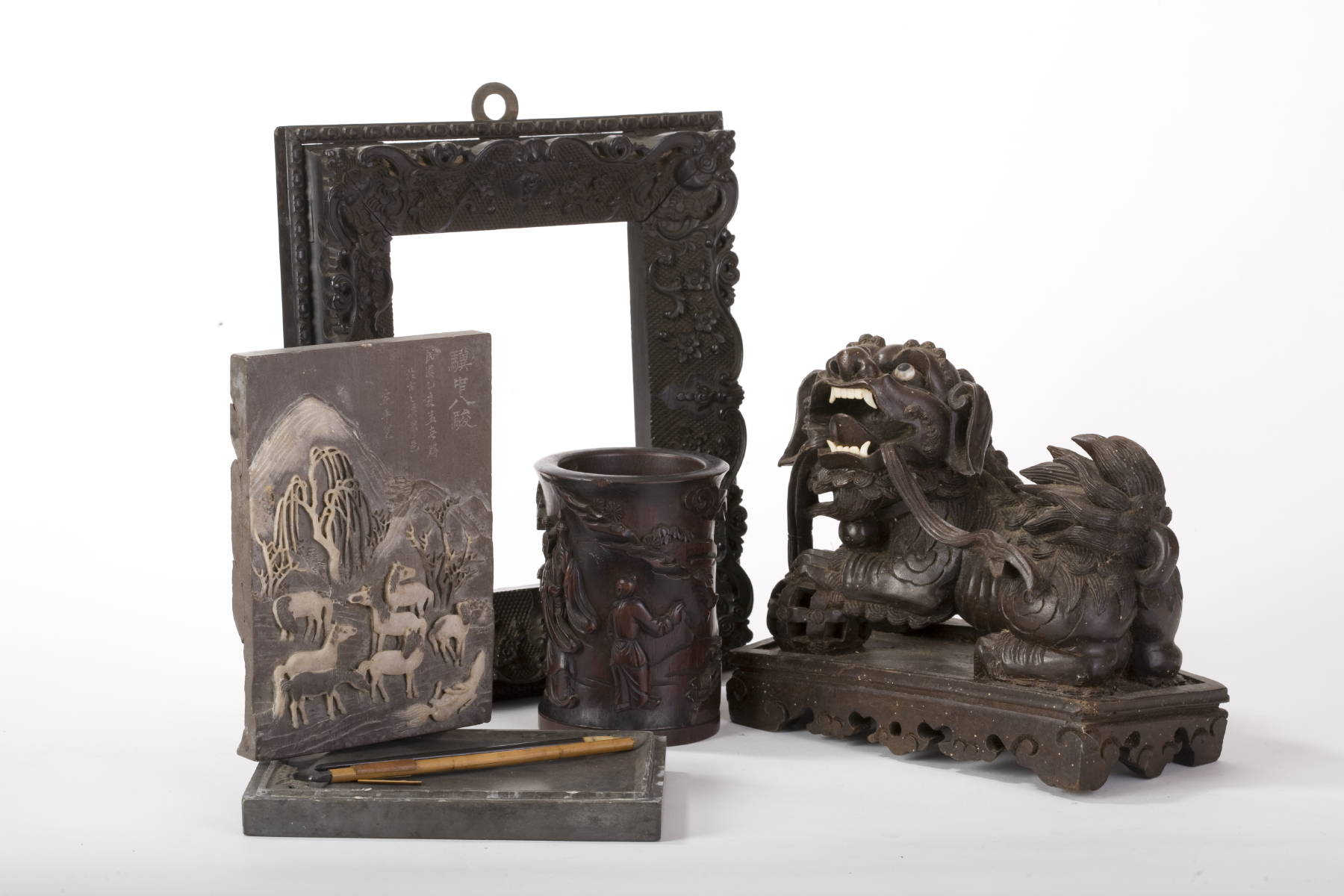 Appraisal: CHINA TRADE CARVED HARDWOOD FRAME A FOO LION A BRUSH