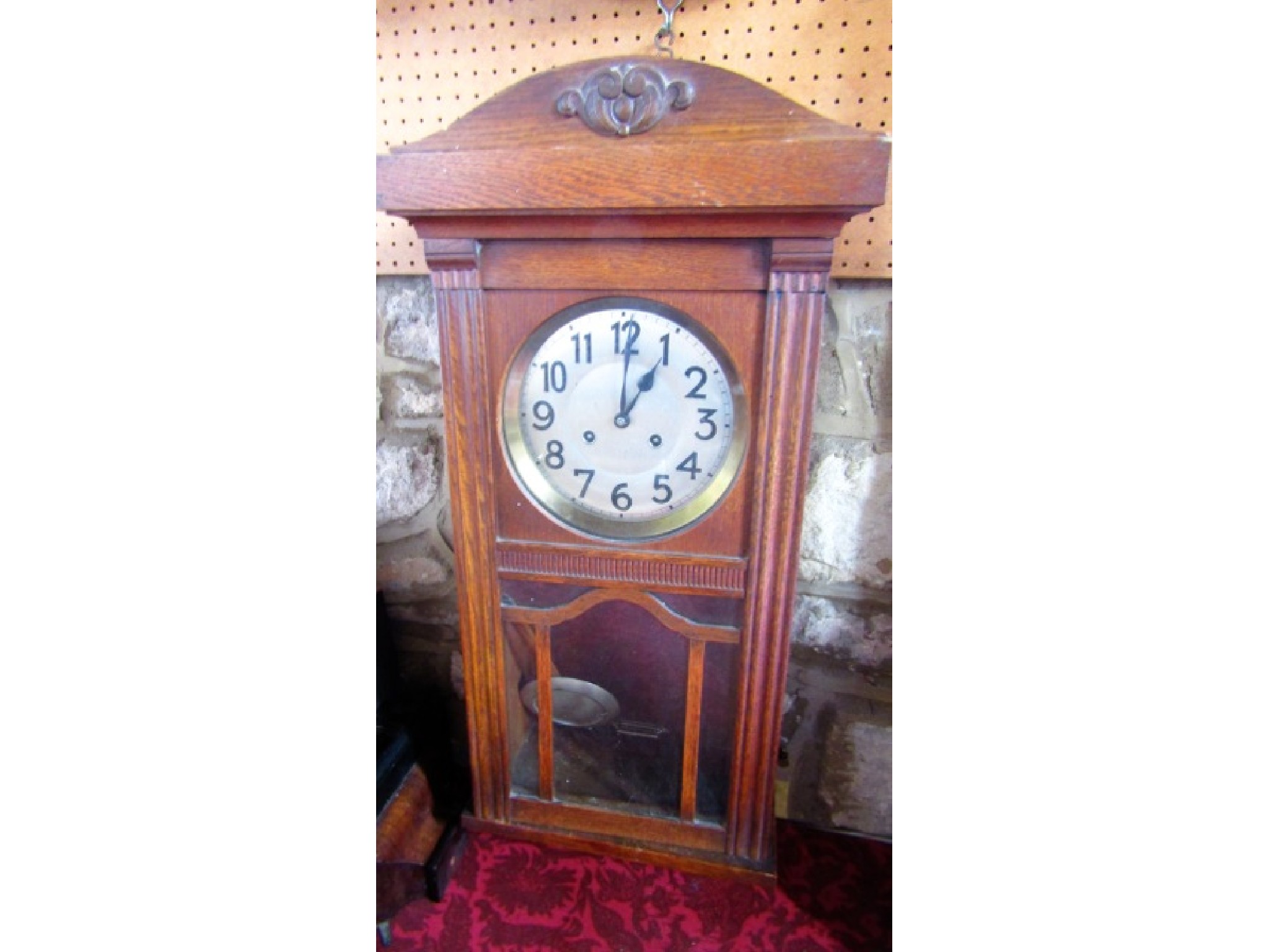 Appraisal: A late Edwardian oak wall clock with anodised dial and