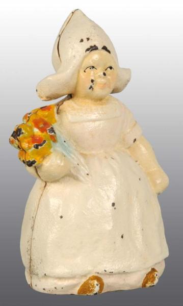 Appraisal: Cast Iron Dutch Girl Holding Flowers Still Bank Description Manufactured