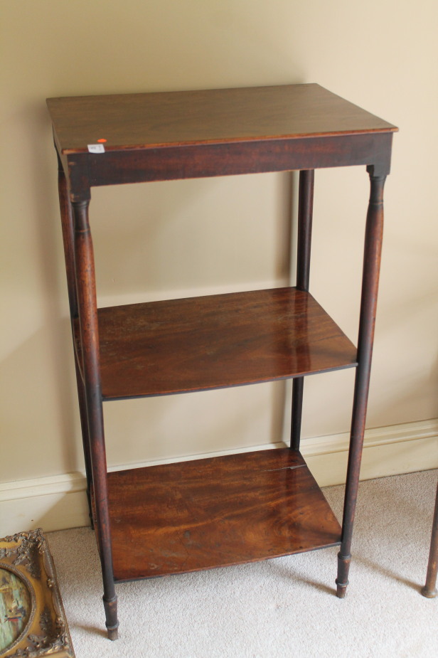 Appraisal: A Victorian mahogany what-not with three rectangular shelves on turned