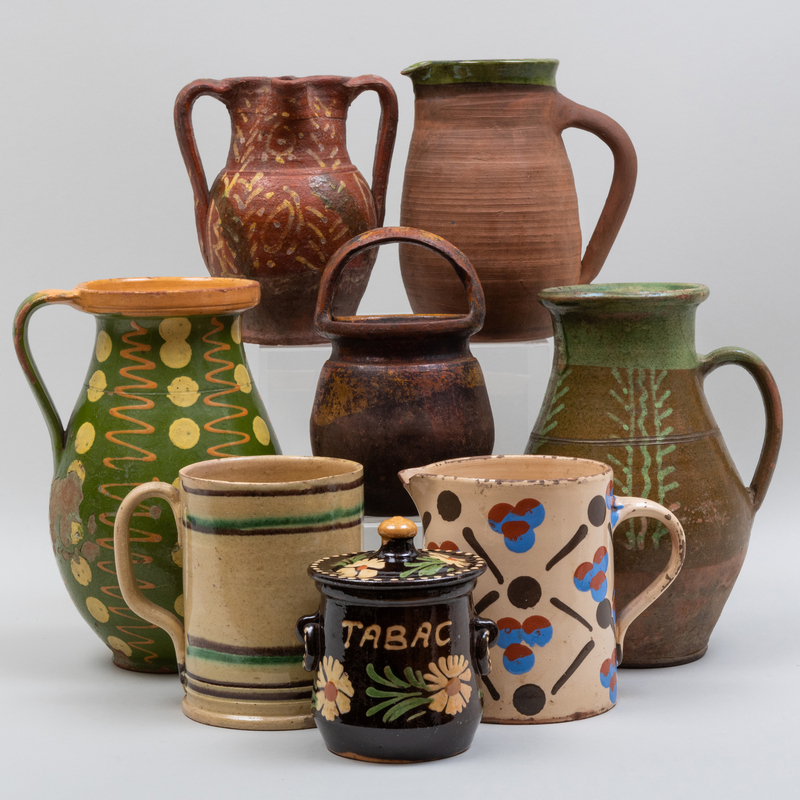 Appraisal: Group of Five Earthenware Pitchers and a Group of Slip