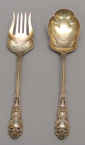 Appraisal: Retailed by Bigelow Kennard Co pierced cast handles with mask