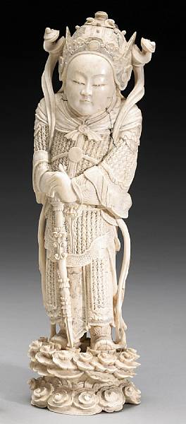 Appraisal: A tinted ivory figure of Weituo th Century The youthful