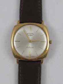 Appraisal: A ct gold gent's cushion shaped wrist watch by Rotary