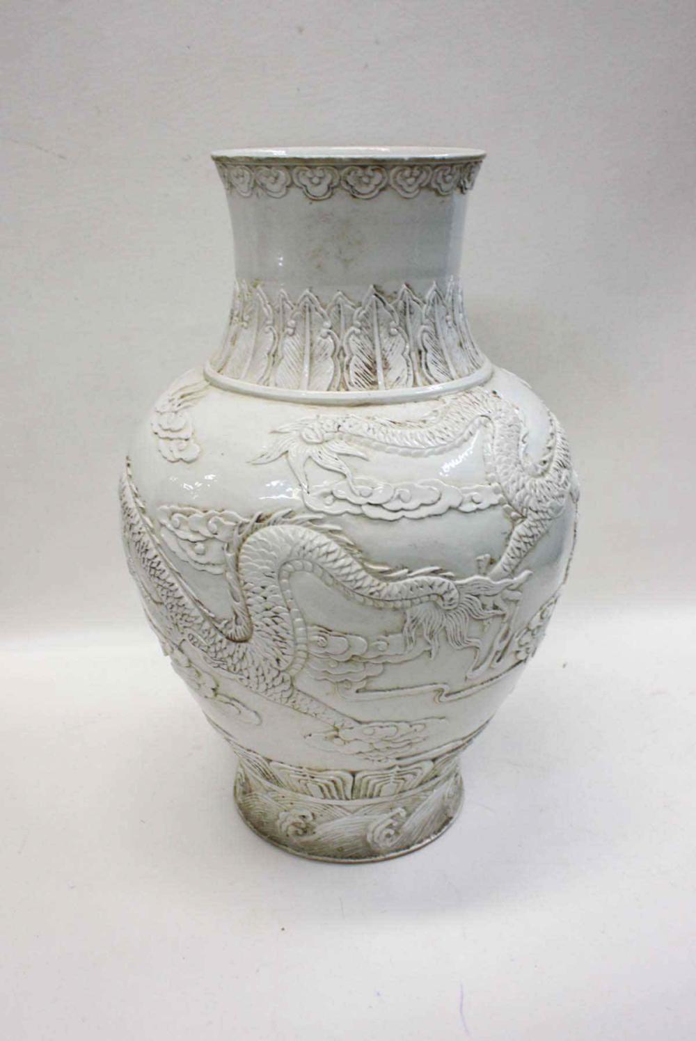 Appraisal: CHINESE BLANC DE CHINE PORCELAIN DRAGON VASE baluster form with