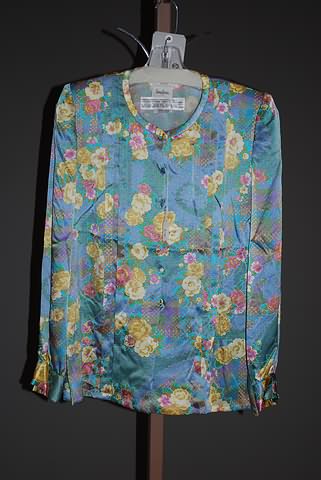 Appraisal: Andr Laug blue floral silk long sleeve blouse with pleats