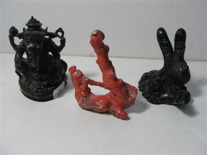 Appraisal: Two Chinese organic carvings and Indian rosewood DeityFingerling form carvings