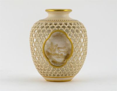 Appraisal: A Royal Worcester double-walled reticulated vase in the manner of