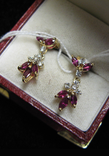 Appraisal: PAIR OF RUBY DIAMOND AND FOURTEEN KARAT GOLD PENDANT EARRINGS