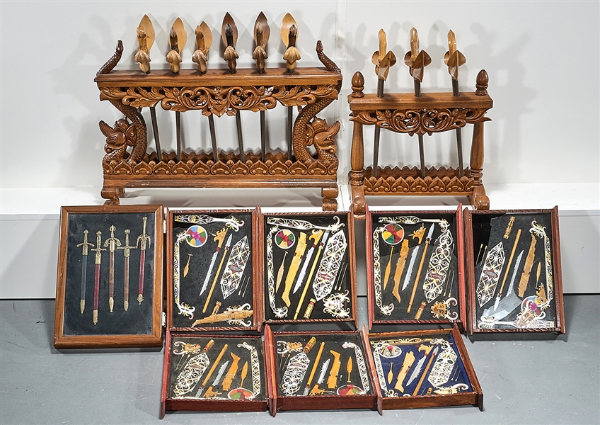 Appraisal: Large group of various collectible weapons with stands cases case