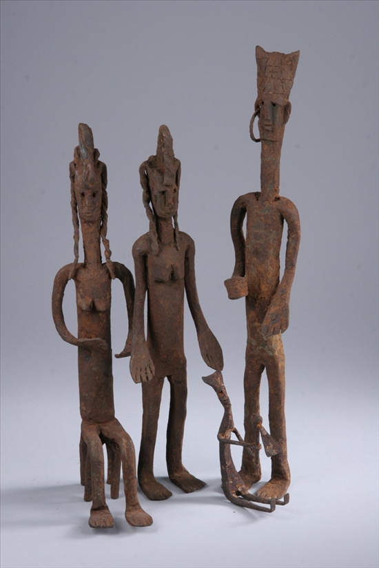 Appraisal: BAMBARA BURNIKO FASO AND DOGON IRON FIGURES Tall male figure