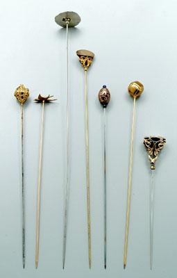 Appraisal: Seven hat pins two with kt gold tops one openwork