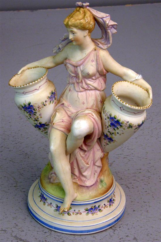 Appraisal: Twentieth century Dresden figure of a young lady holding two