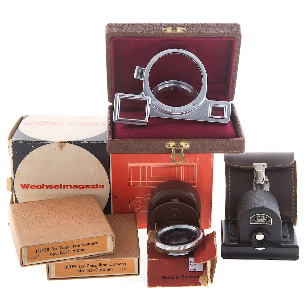 Appraisal: Five Zeiss Ikon Camera Accessories Lens includes optical attachment in