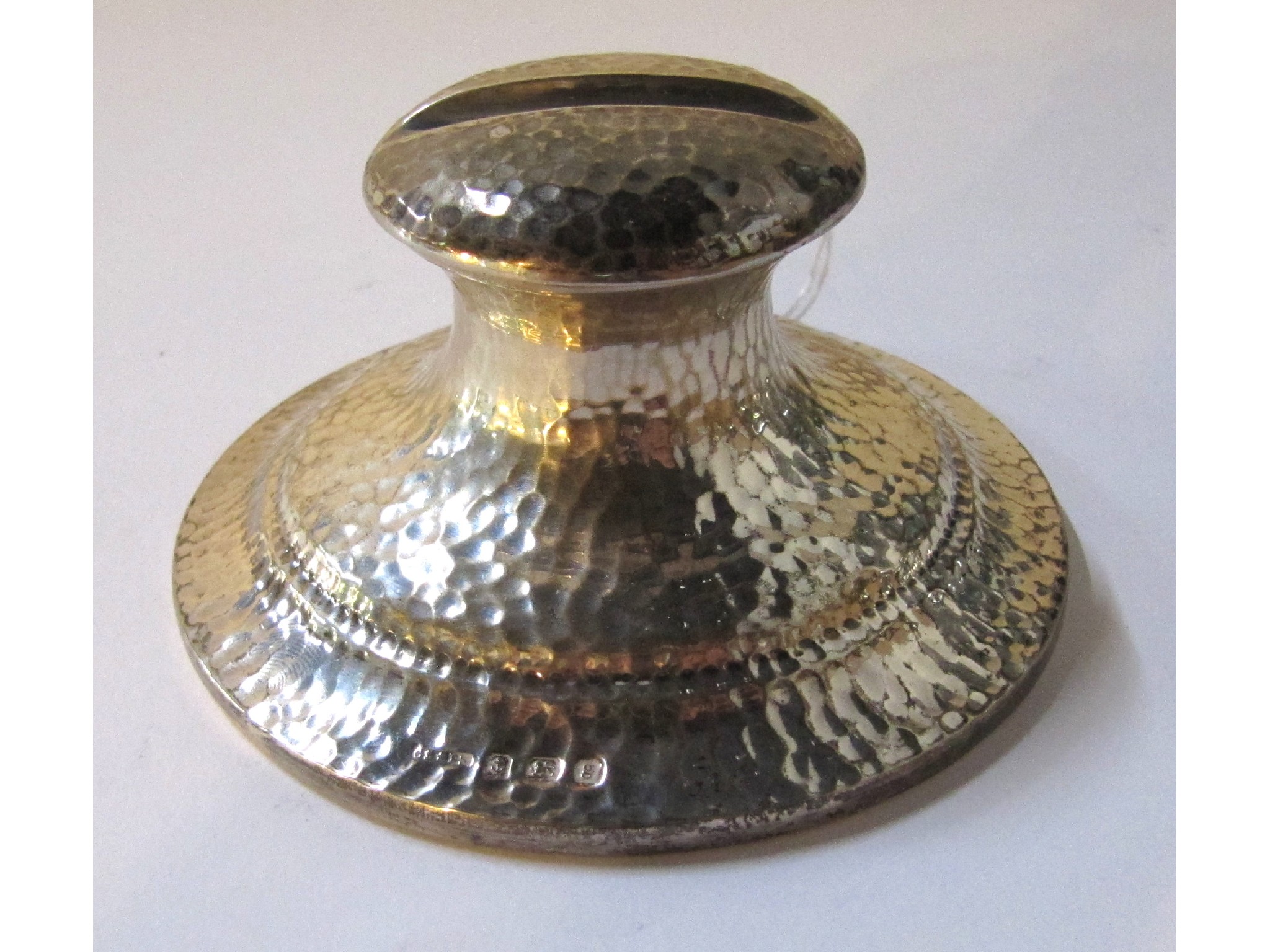 Appraisal: A hammered silver Capstan inkwell Birmingham