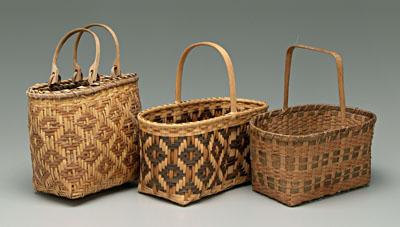 Appraisal: Three Cherokee baskets one river cane shopper double hinged handles