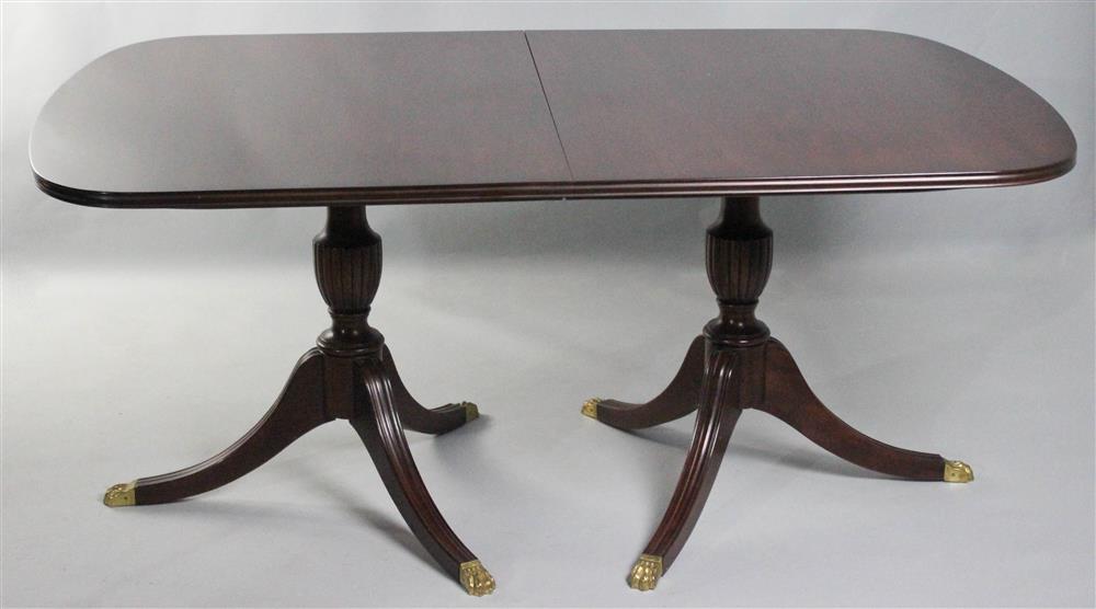 Appraisal: HENKEL HARRIS REGENCY STYLE TWO PEDESTAL MAHOGANY DINING TABLE the