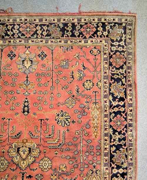 Appraisal: A carpet of Ushak design woven in muted colours with