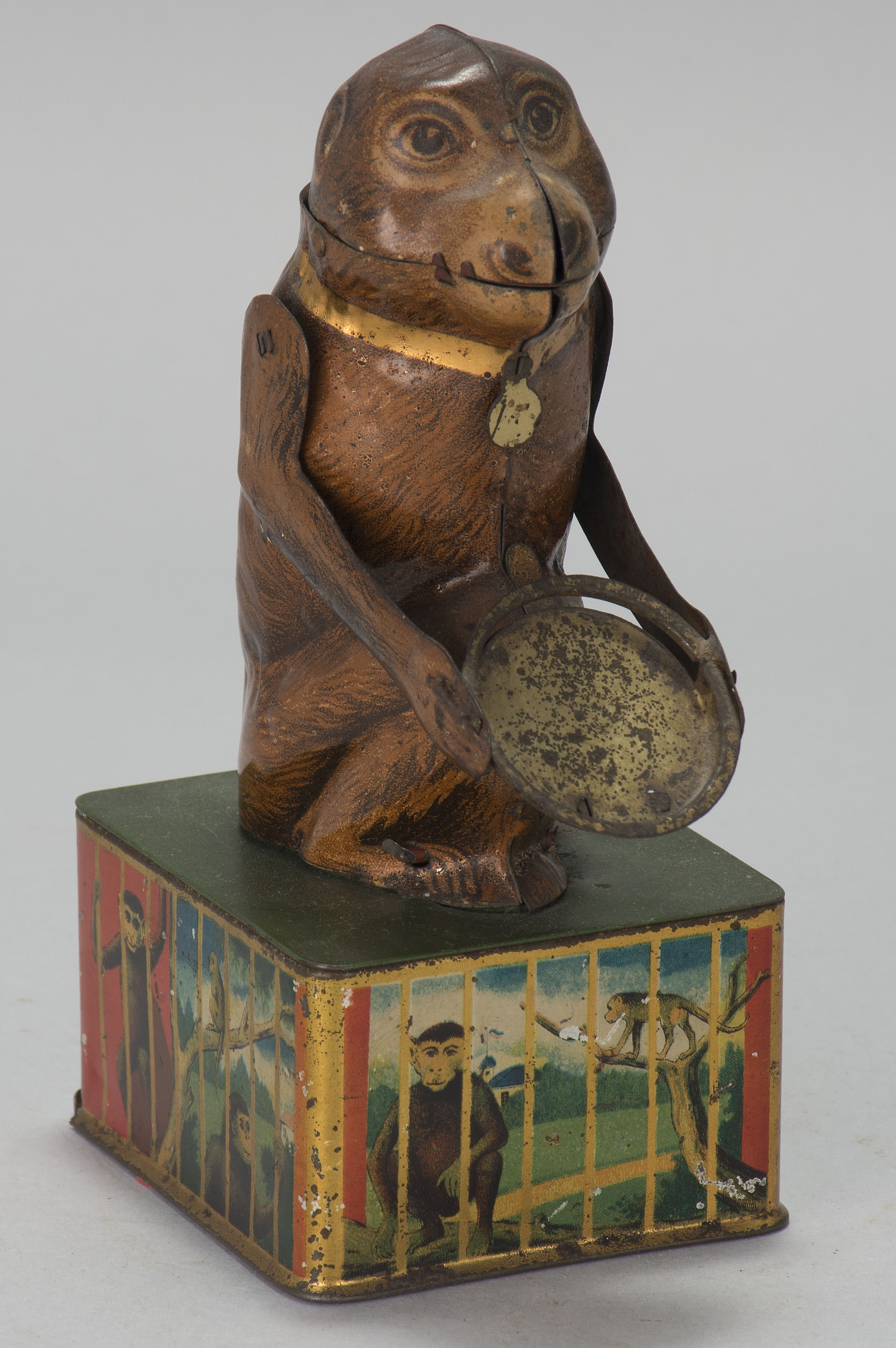 Appraisal: MONKEY WITH TRAY TIN MECHANICAL BANK German Circa Original finish