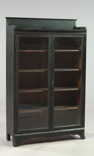 Appraisal: American Late Victorian Oak Double-Door Bookcase ca the front fitted