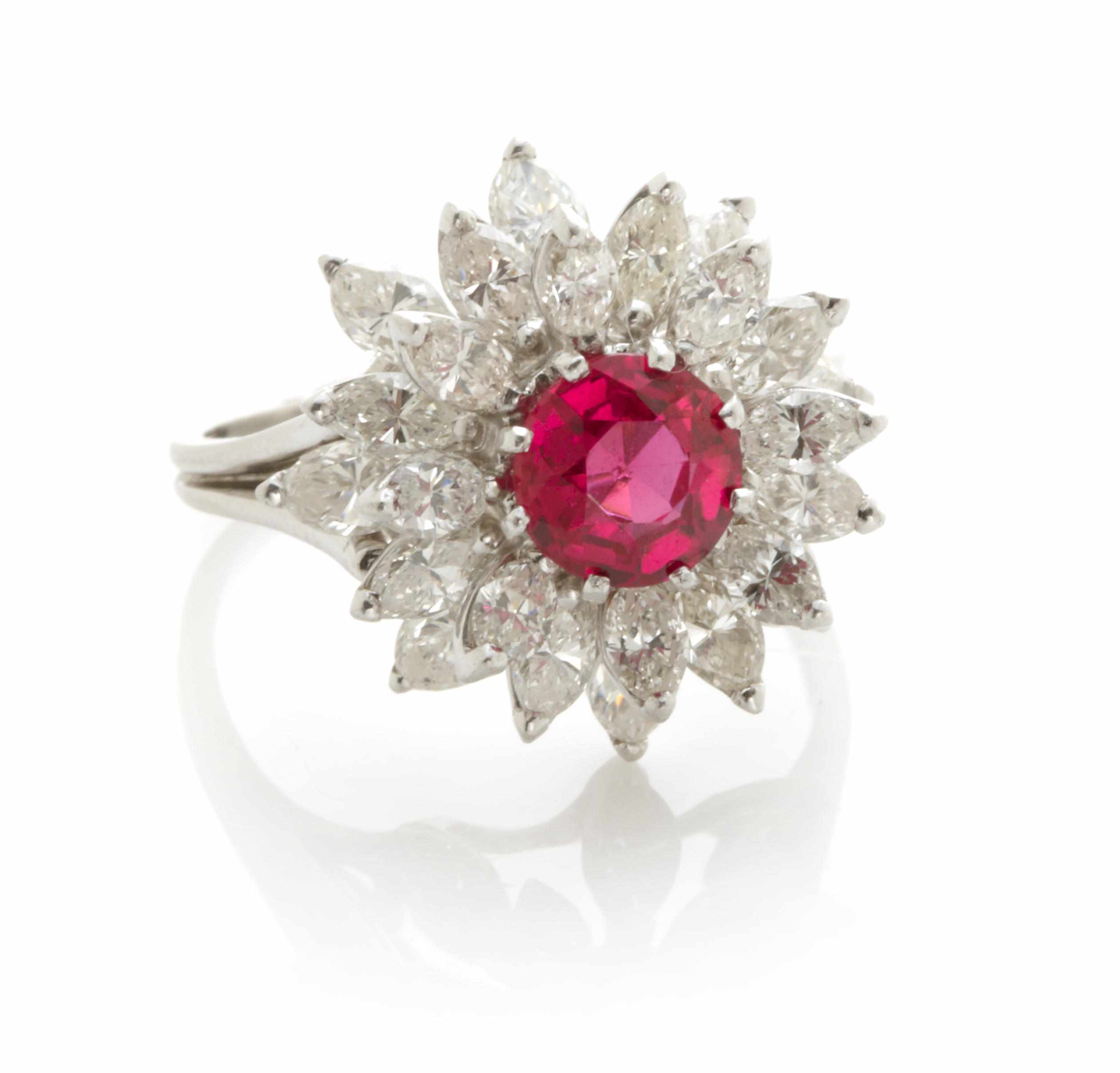 Appraisal: A red stone diamond and platinum cluster ring estimated total