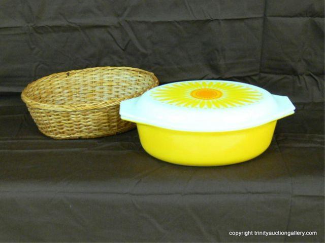 Appraisal: Pyrex Daisy Quart Covered Casserole Oval with Lid and Wicker