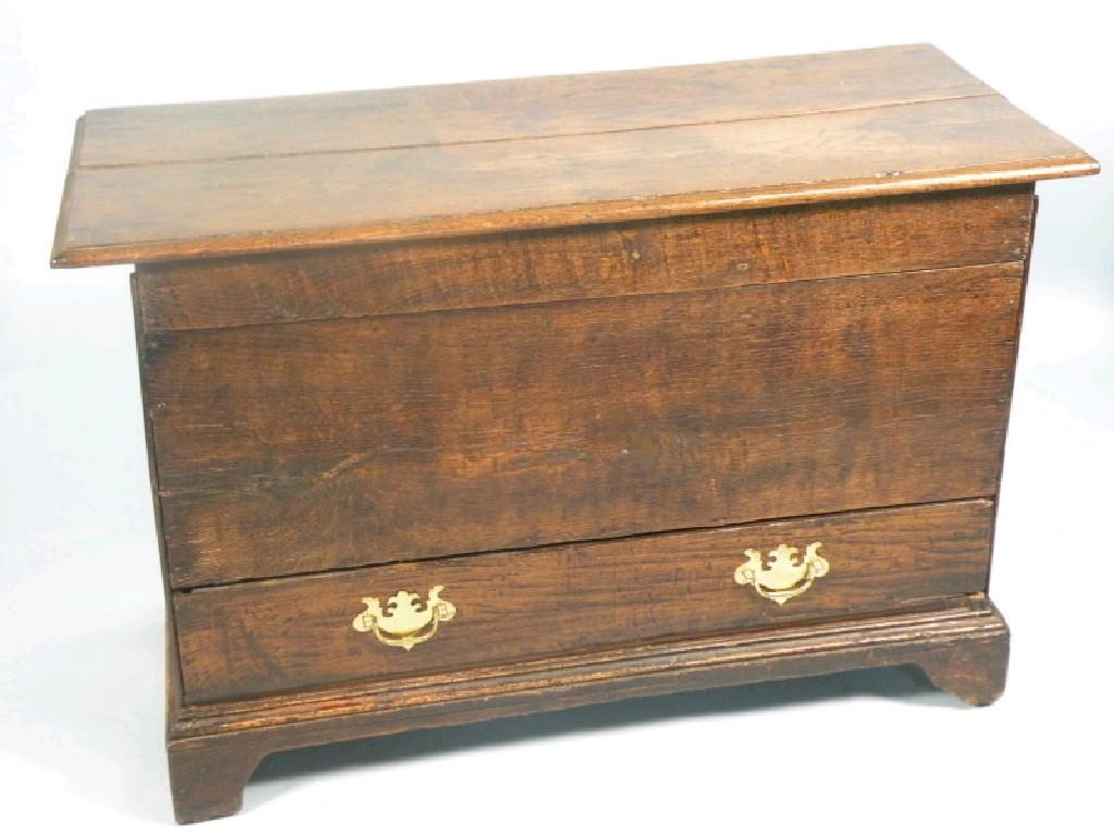 Appraisal: An oak mule chest the planked top with a moulded