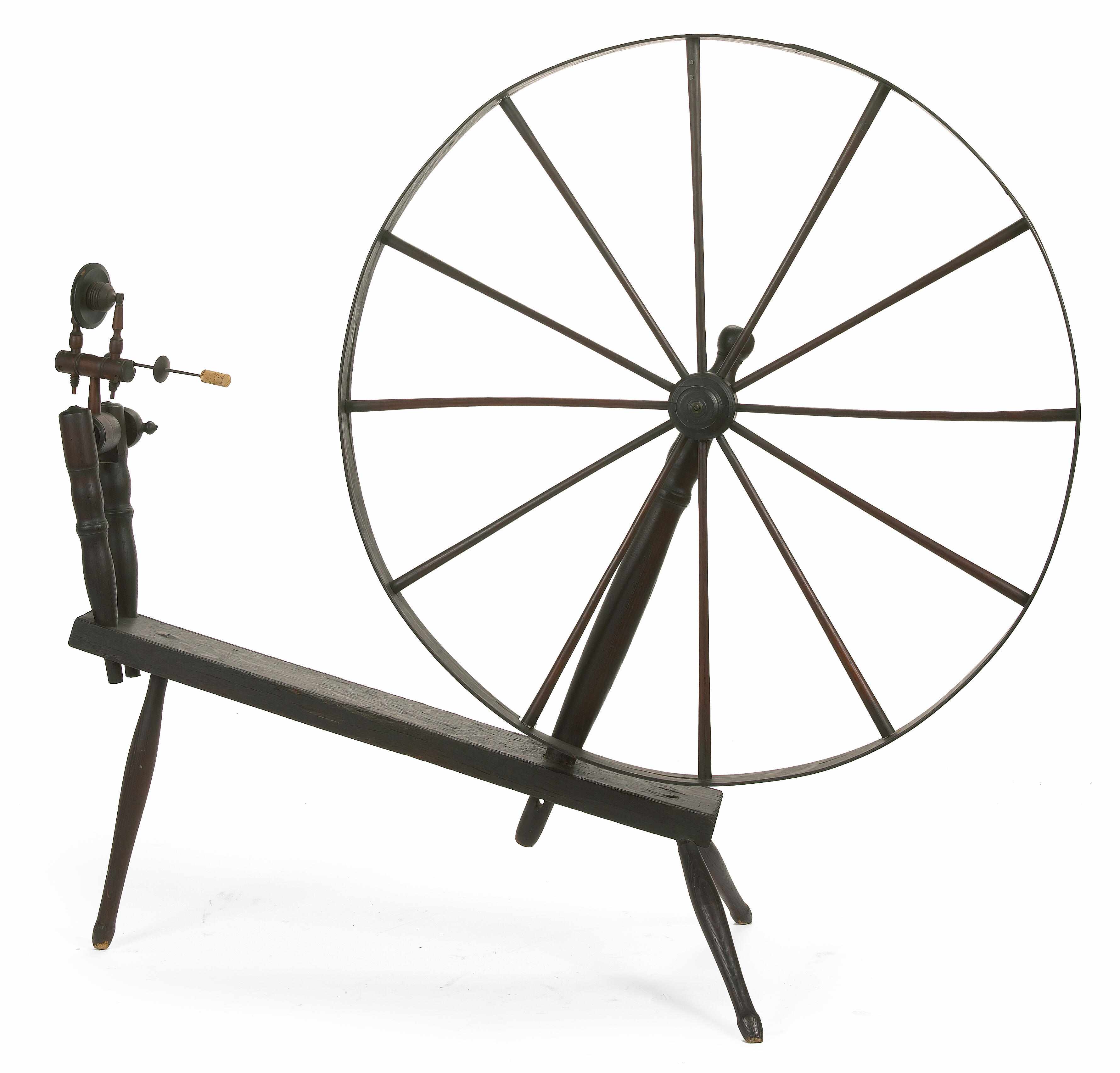 Appraisal: A mixed wood spinning wheel of large size th centuryheight