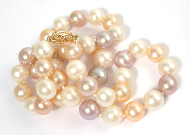 Appraisal: MULTI-COLOR PEARL PRINCESS-LENGTH NECKLACE Mixed pink white and violet luster