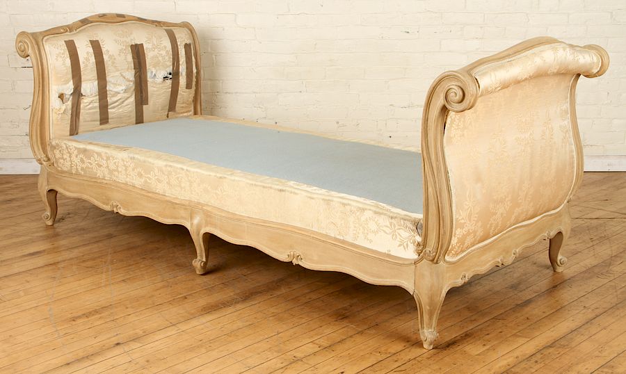 Appraisal: FRENCH LOUIS XV STYLE PAINTED CARVED DAY BED A French