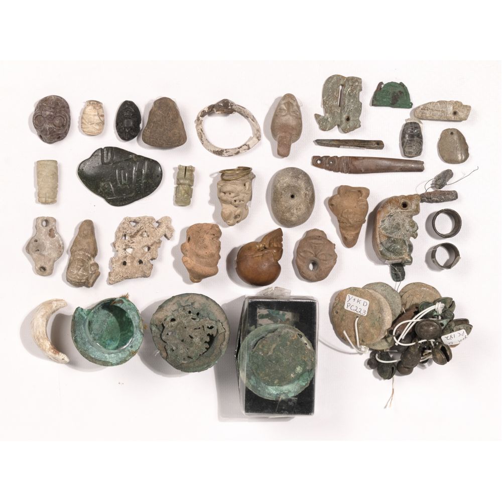 Appraisal: PRE-COLUMBIAN ORNAMENTAL OBJECT ASSORTMENTApproximately items including copper ear spools with