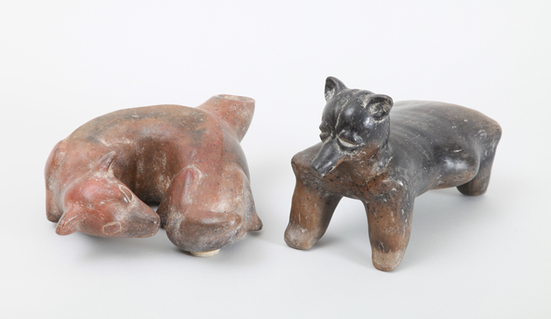 Appraisal: TWO MEXICAN PRE-COLUMBIAN STYLE POTTERY FIGURES OF DOGS The one