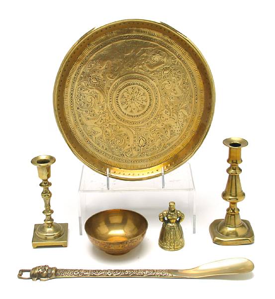 Appraisal: A collection of brass table articles comprising two trays four