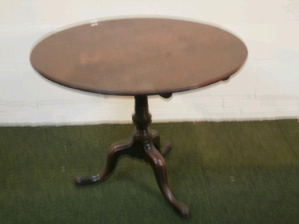 Appraisal: A George III circular top pedestal table raised on three