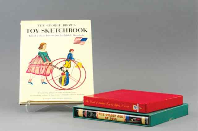 Appraisal: TWO TOY REFERENCE BOOKS WITH GEORGE BROWN SKETCH B Includes