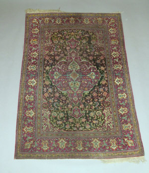 Appraisal: A Tabriz rug with elaborate medallion in a floral and