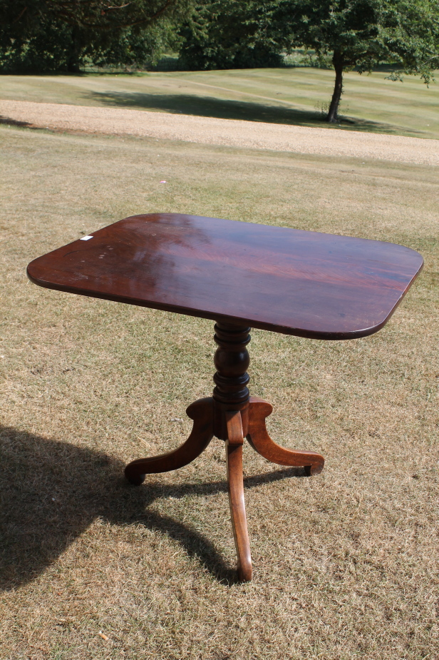 Appraisal: A William IV mahogany tripod table with rectangular tilt top