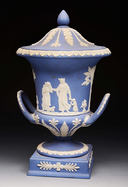 Appraisal: A WEDGWOOD BLUE JASPERWARE TWIN HANDLED URN AND COVER of