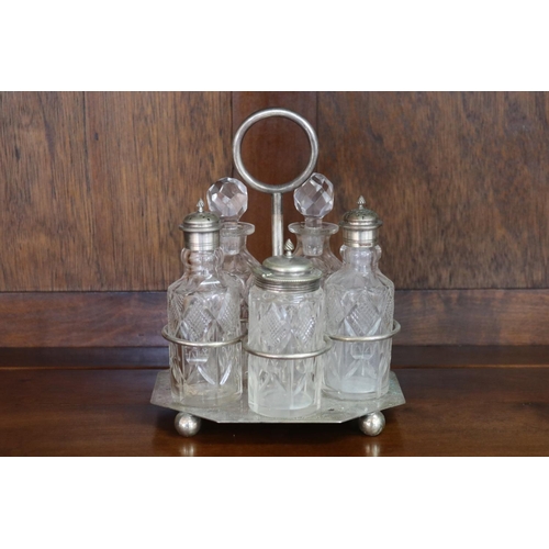 Appraisal: Silver plated five bottle cruet stand approx cm H x