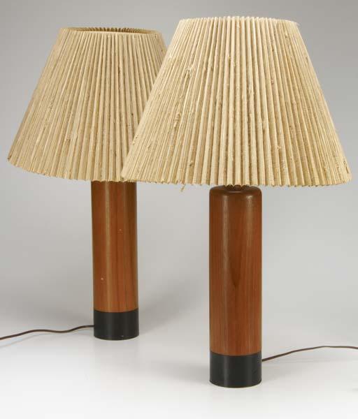 Appraisal: DANISH Pair of turned wooden table lamps with pleated raffia