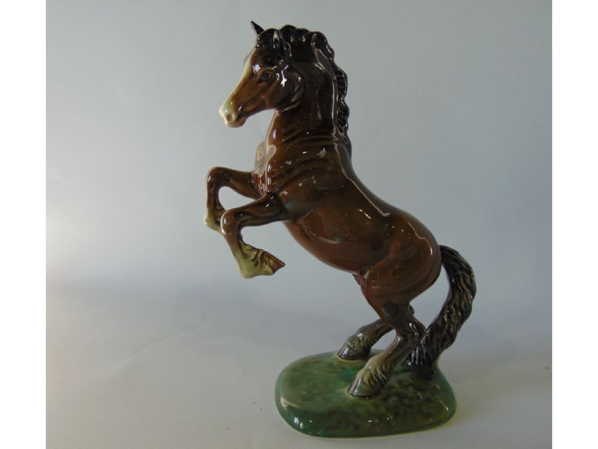 Appraisal: A Beswick model of a rearing brown shire type horse