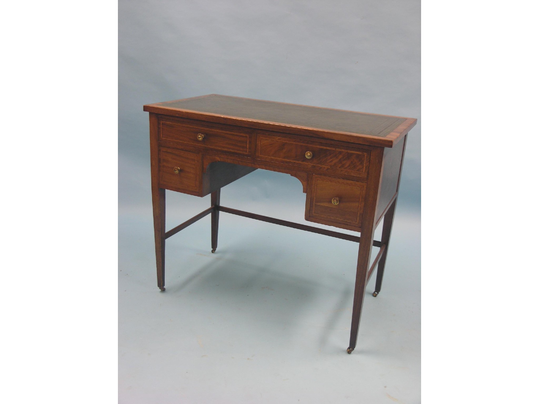 Appraisal: A late Victorian inlaid mahogany writing desk inset tooled leather