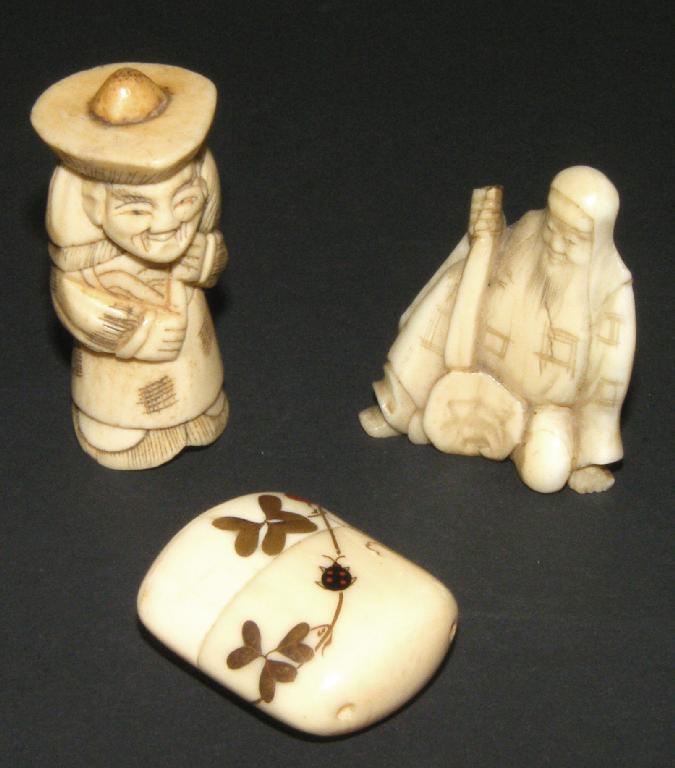 Appraisal: Japanese carved ivory Netsuke in the form of a man