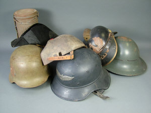 Appraisal: A German WWI steel bullet proof sniper helmet reinforce six