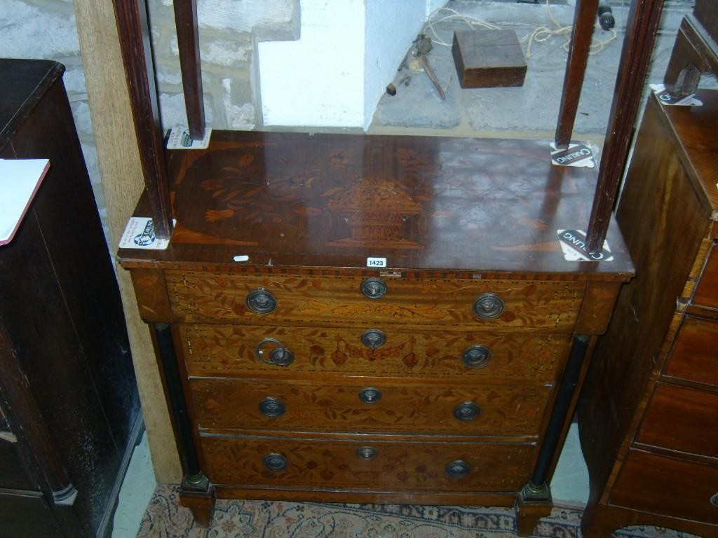 Appraisal: An early th century Dutch chest of four long drawers